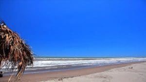 White sandy beach and deep blue sky of Sesteo Riviera Nayarit