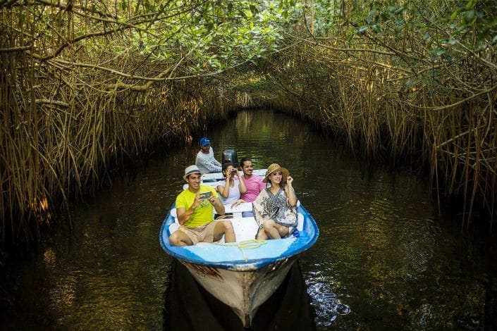 Birdwatching in Riviera Nayarit Mexico - image of 2 couples in a boat birdwatching