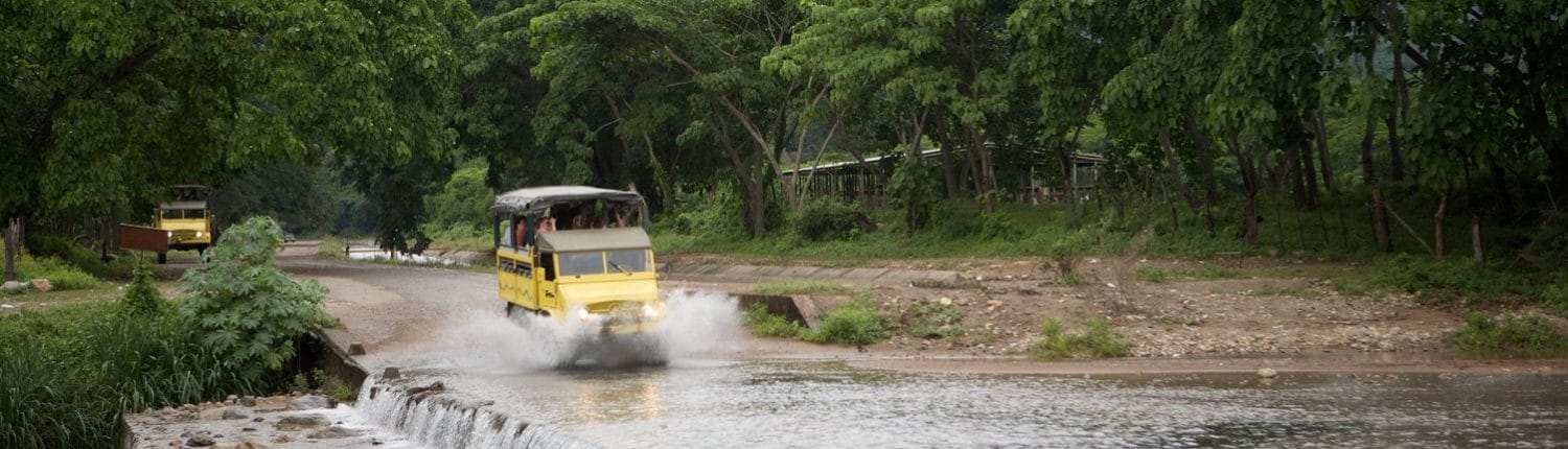 Outdoor Adventures in Riviera Nayarit Mexico - image of all terrain vehicle crossing a stream