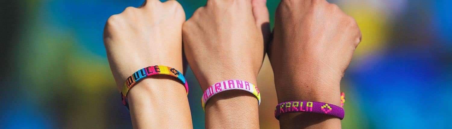 3 arms showing wrist bands- Acerca-de-Nosotros Riviera Nayarit Visitors and Conventions Bureau