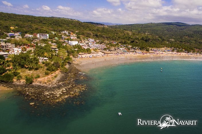 Aerial view of beach and town of Chacala in Riviera Nayarit Mexico