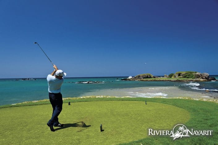 Golfing to island green at Punta Mita Golf Course in Riviera Nayarit Mexico