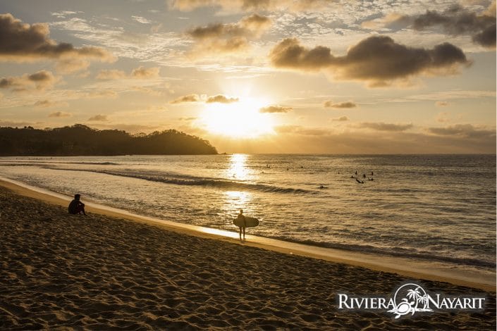 Surfing at sunset in Sayulita Riviera Nayarit Mexico