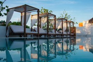 Pool and shaded lounge chairs at Sayulinda Hotel in Sayulita MX